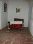 Schlafzimmer mit alten Terrakotta Böden